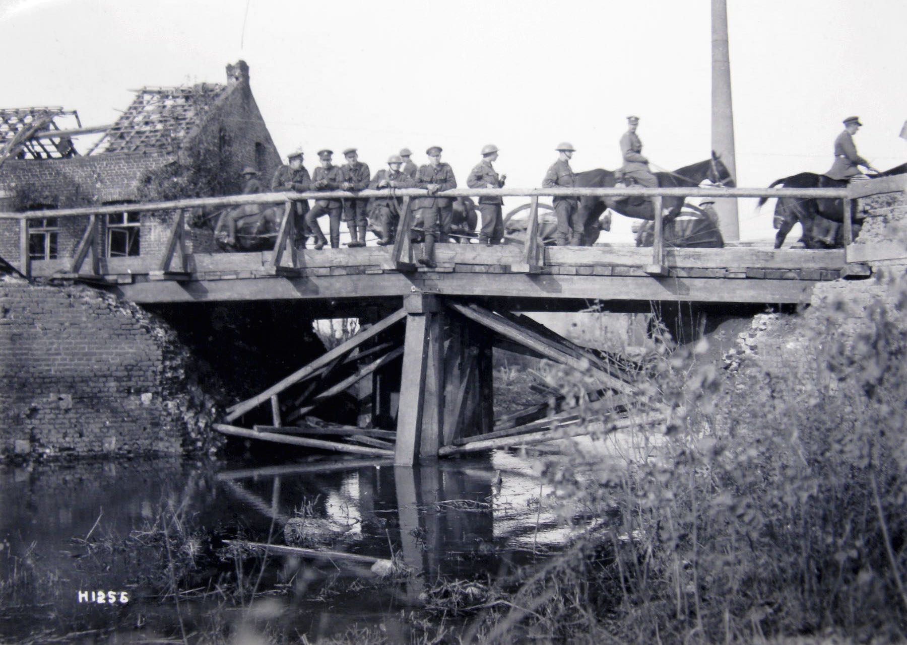 British soldiers passing a newly constructed temporary bridge on the Front